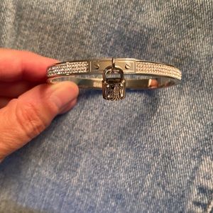 Stainless steel bracelet with small lock and diamond- like inlay crystal